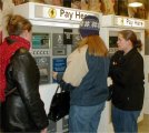 Paying for the parking with Dan's money