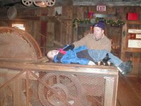 Jim putting Michael on a saw